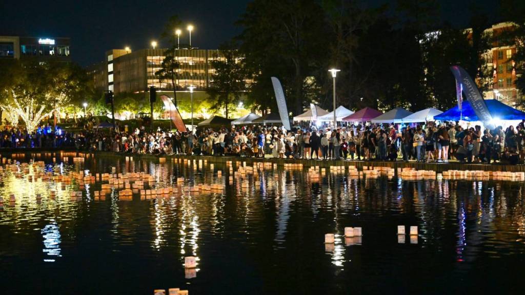 Image shows a water lantern festival.