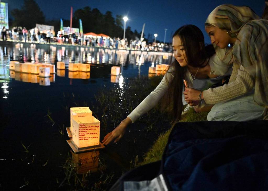 Image shows a water lantern festival.