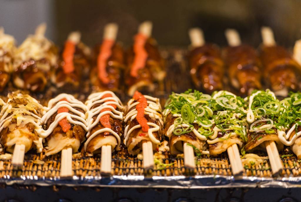 Image shows Asian street food.
