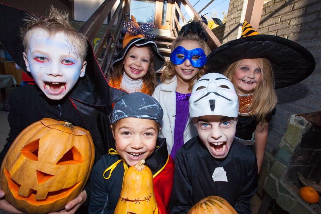 Image shows trick-or-treaters.