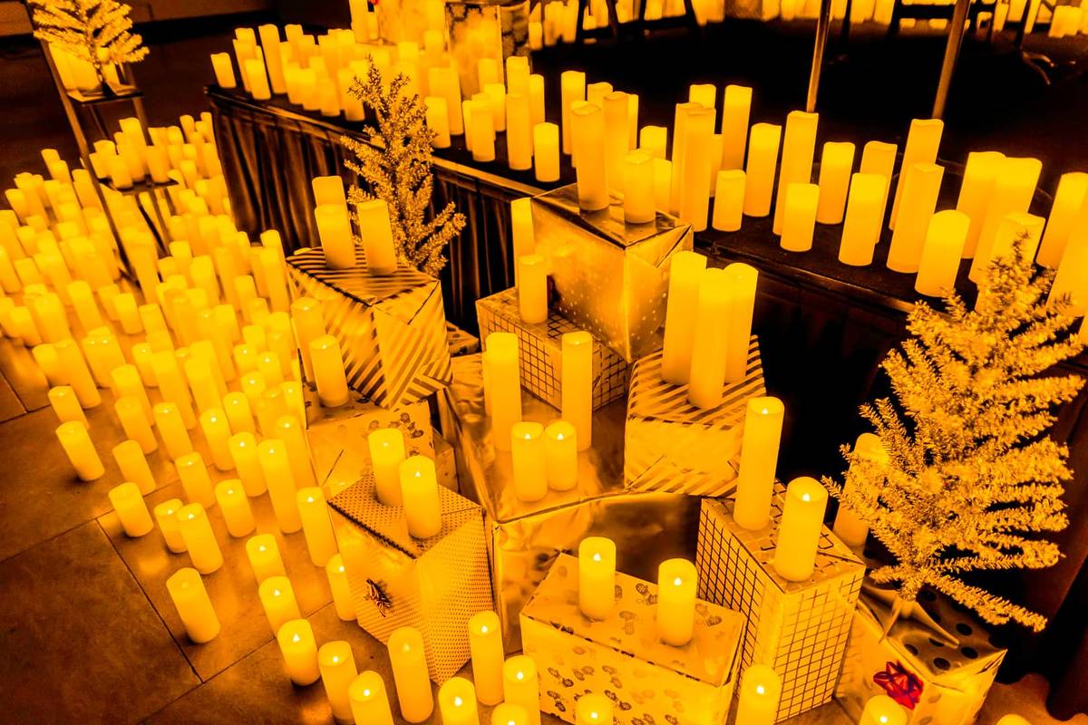 candles sit on top of presents