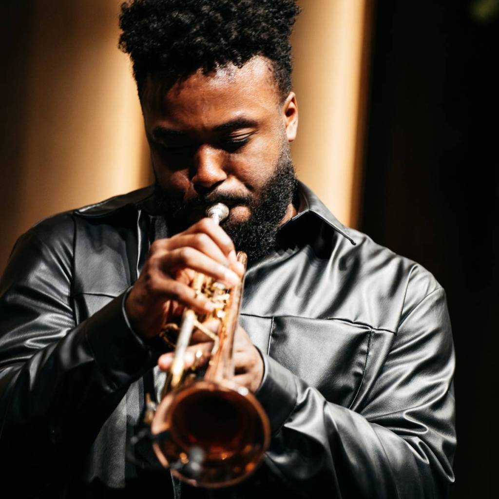 a man playing a saxophone