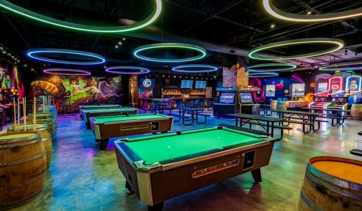 You Can Play Until You Drop At This 10,000-Square-Foot Arcade Covered In Murals