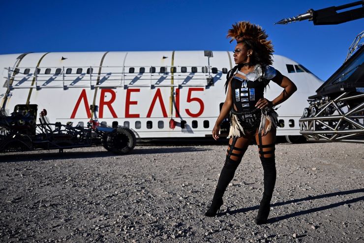 woman posing in front of the Boeing 747