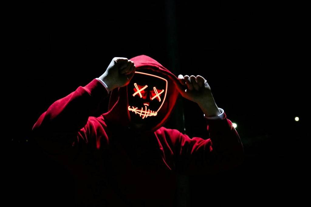 scary person wearing a red hoodie