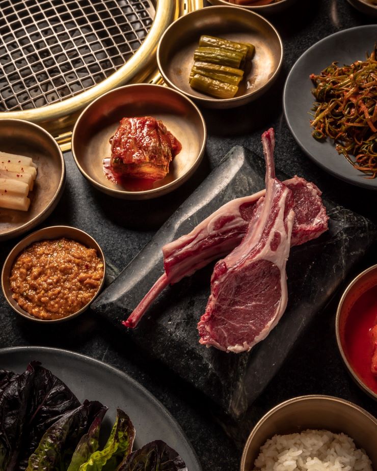 steaks and sides at COTE Korean Steakhouse