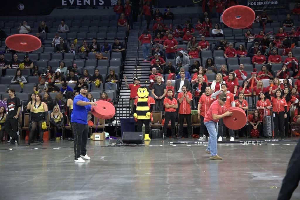 people participating at housekeeping Olympics in Vegas