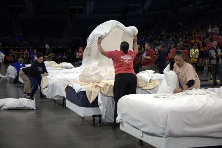 women making beds