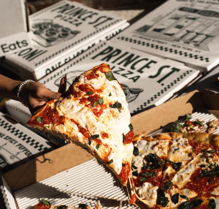 Prince St. Pizza slice and box