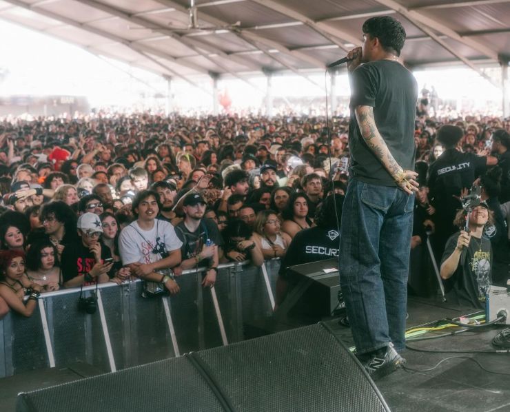 crowd at rock festival Sick New World