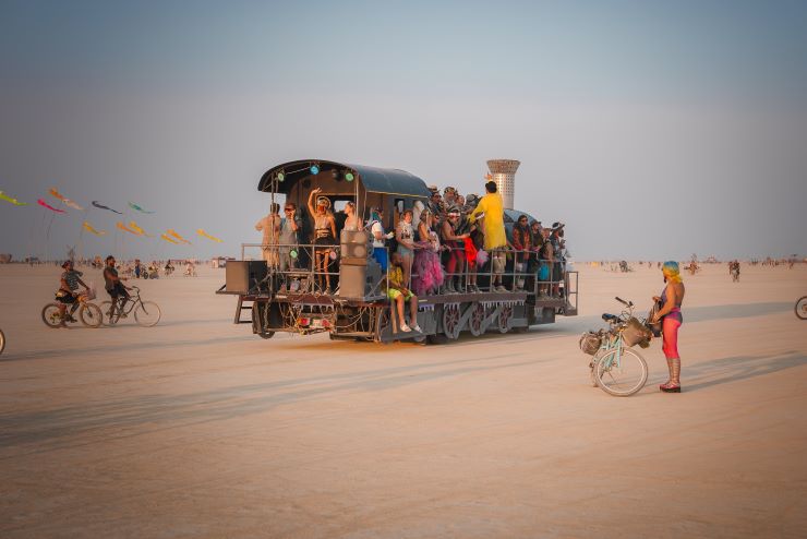 people at a festival in the desert