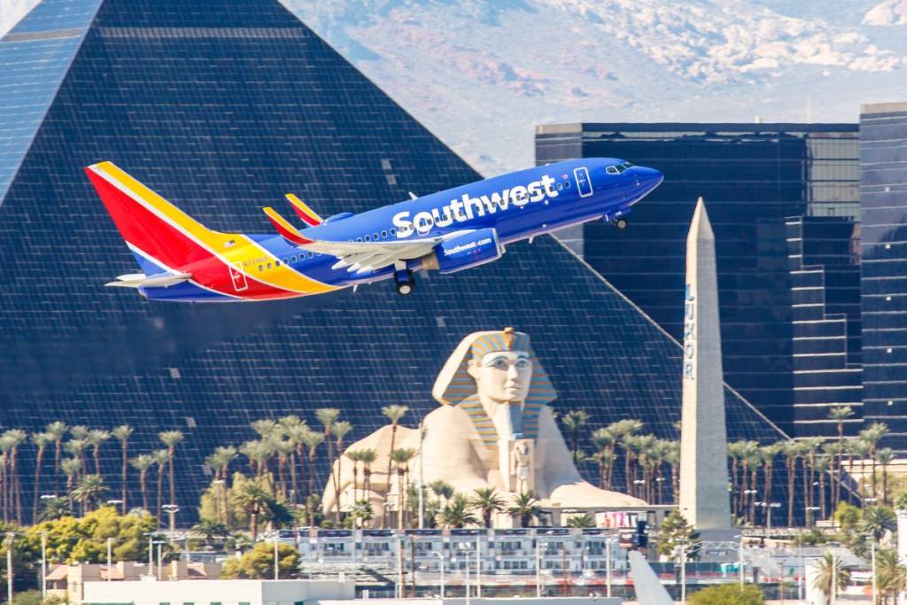 plane flying over Vegas