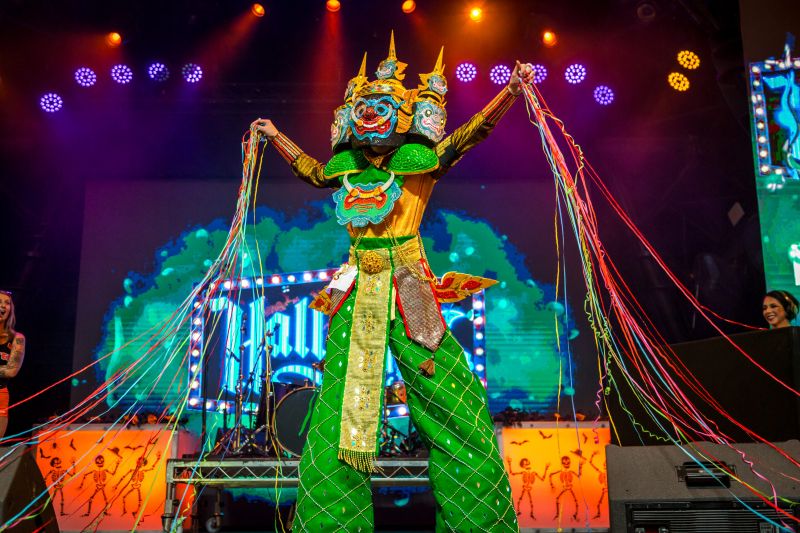 a green Halloween costume on a stage