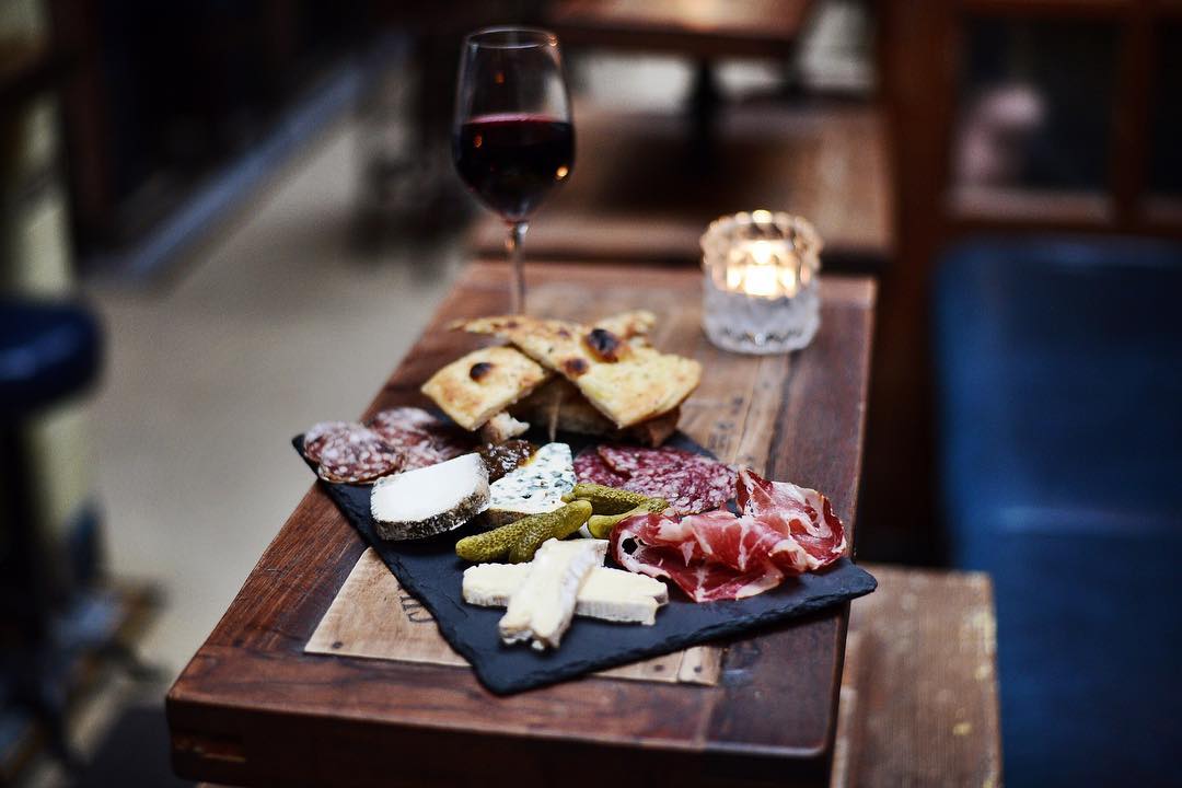 7 Delicious Wine Bars To Celebrate National Wine And Cheese Day