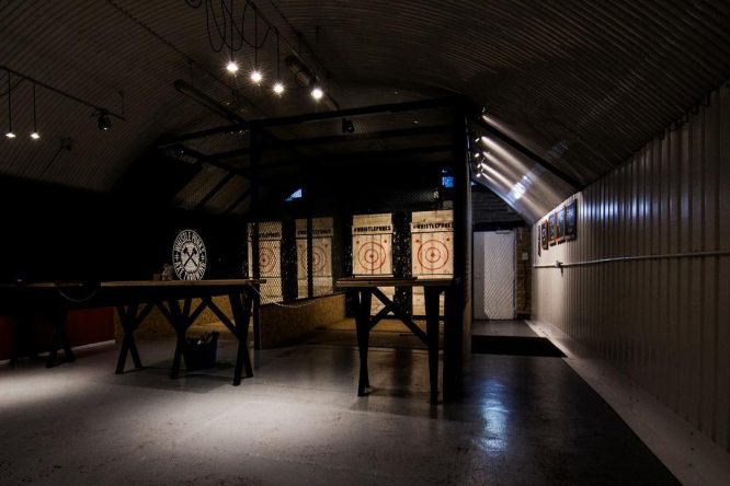 The axe throwing gallery at Whistlepunks – one of the best stag do ideas in London