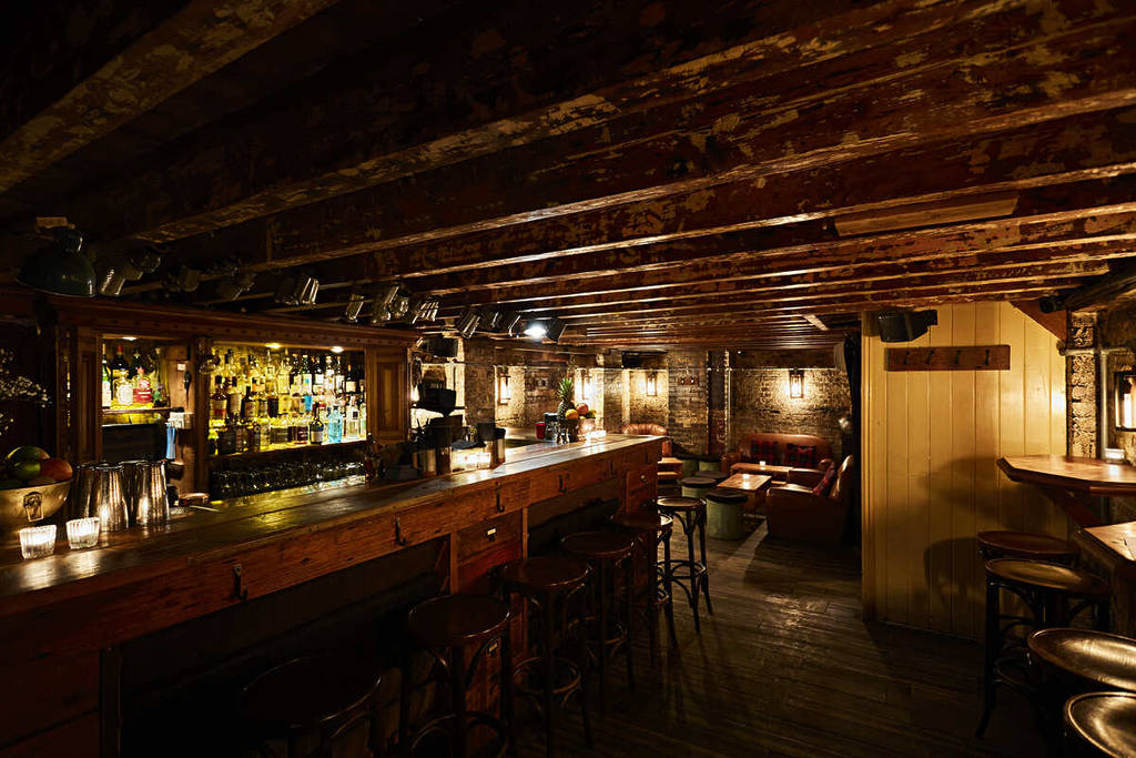 Discount Suit Company Is A Cosy Cocktail Bar In An Old Suit Shop