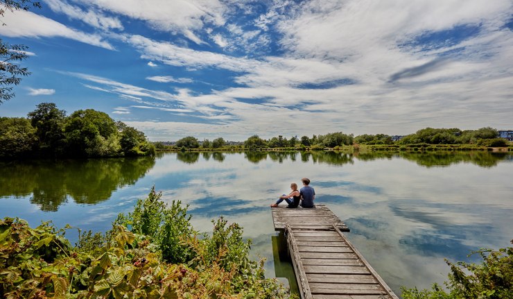 People enjoying the scenery at the Walthamstow Wetlands