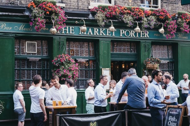 People enjoying themselves outside The Market Porter pub in Borough Market