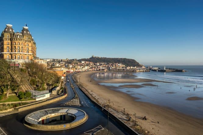 The golden sands and buildings of Scarborough in Yorkshire, one of the best UK beaches