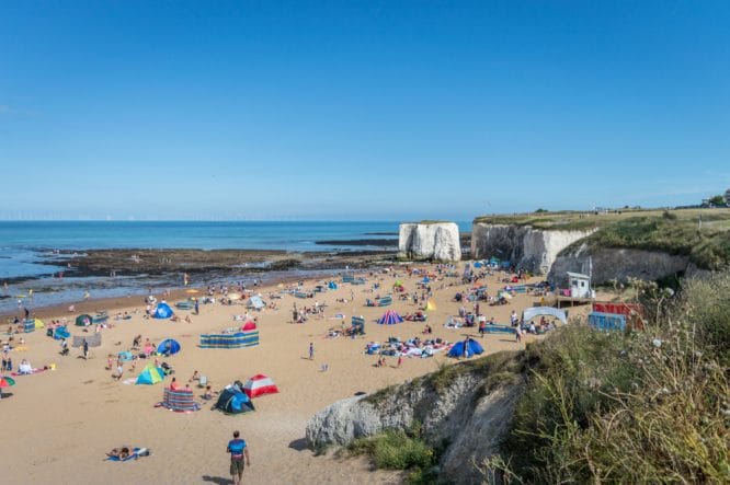 People enjoying themselves on Botany Bay beach in Kent, England