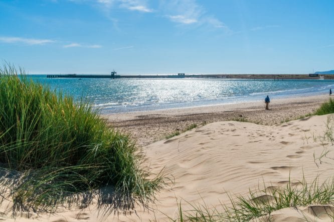 Sunny weather at Camber Sands beach in England