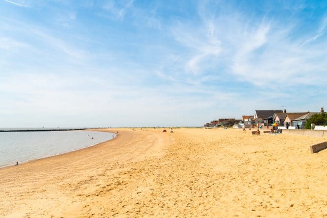 Bright yellow sands at Jaywick Beach in the UK