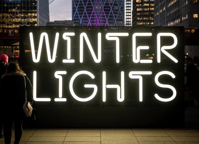 a neon sign reading 'winter lights' in dazzling white