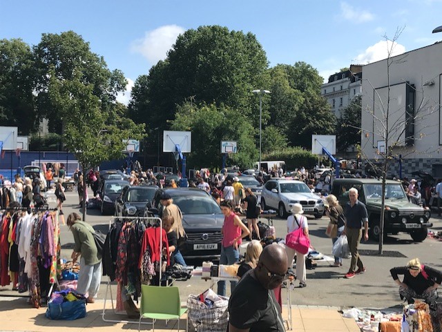 People shopping in sunny weather at the Capital Car Boot Sale