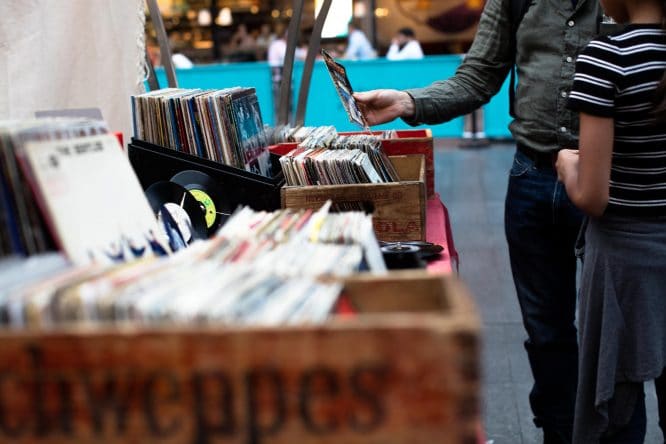 People searching through vinyl records