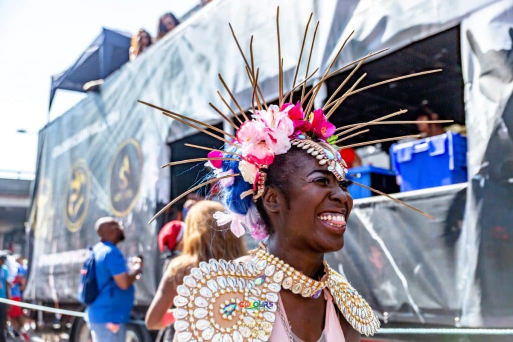a colours carnival participant in Notting Hill Carnival