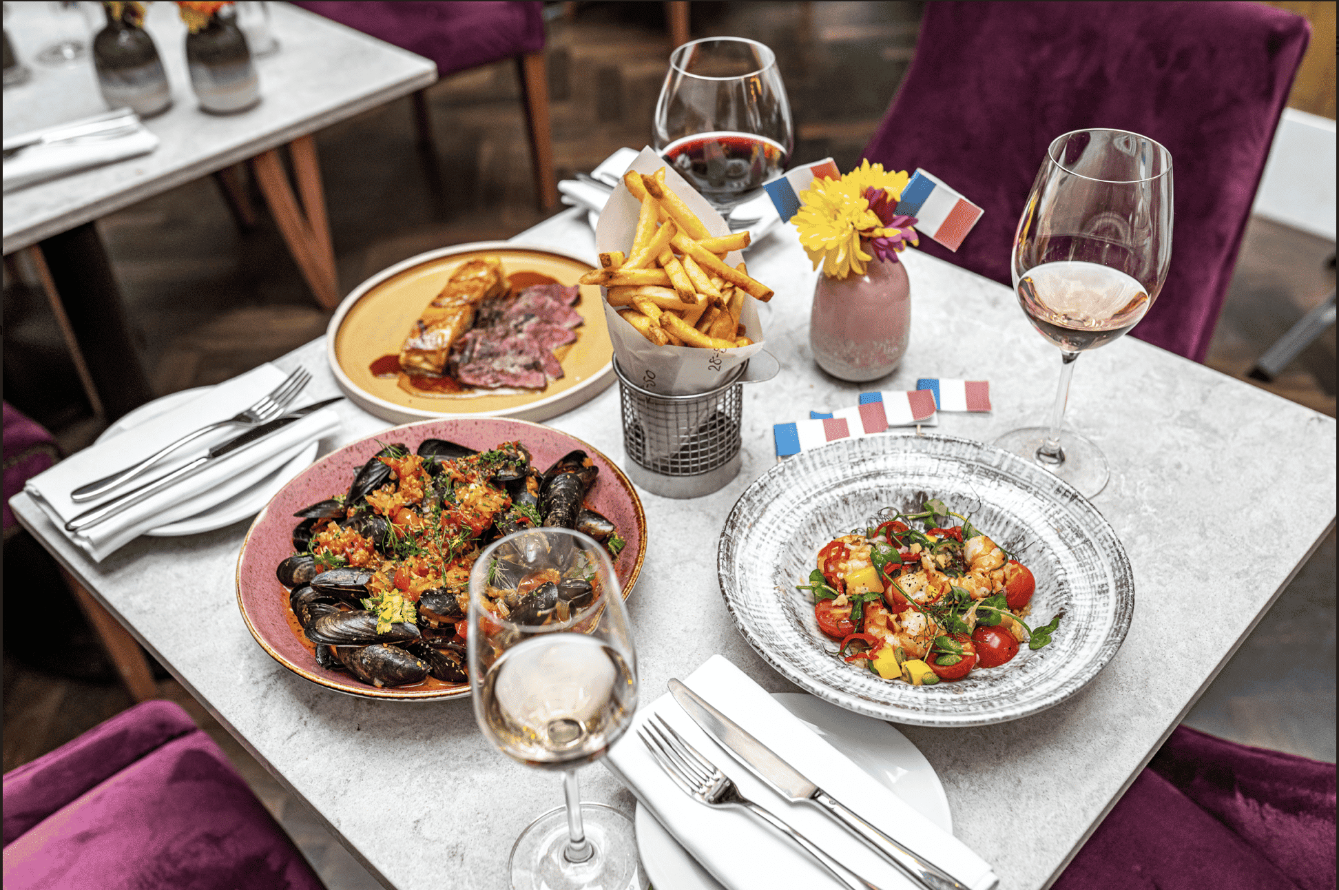 A shot of the Bastille day menu at 28°-50° Wine Workshop & Kitchen
