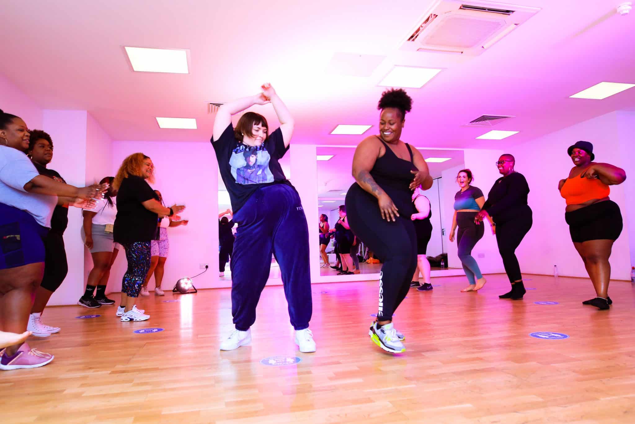 some people dance at a the curve catwalk session