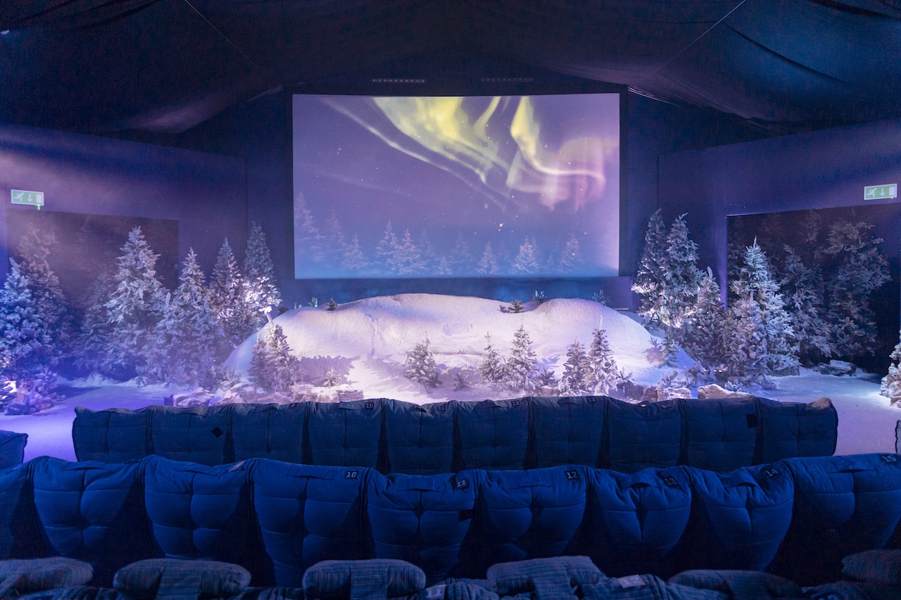beanbags and a snow setting with a screen in the middle at Backyard Cinema