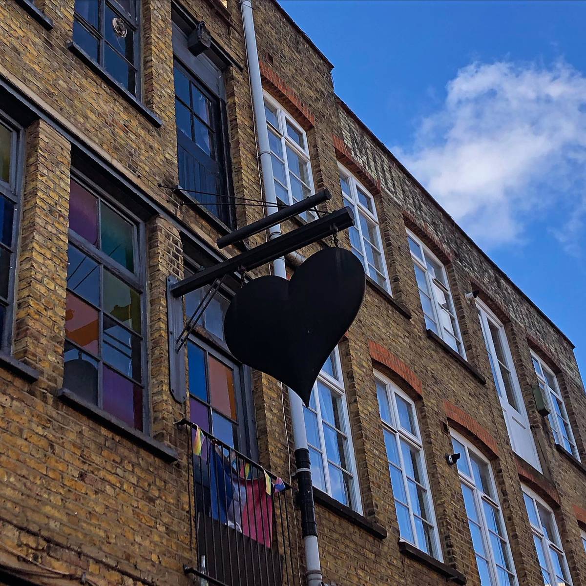 Heart shaped sign for The Black Heart pub in Camden, London.