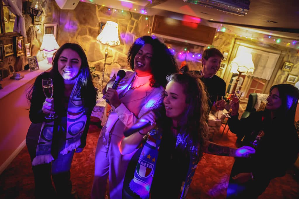 people singing karaoke at Nonnas Attico in Bunga Bunga Covent Garden
