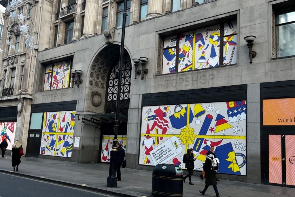 people walking past IKEA's soon to open Oxford Circus location