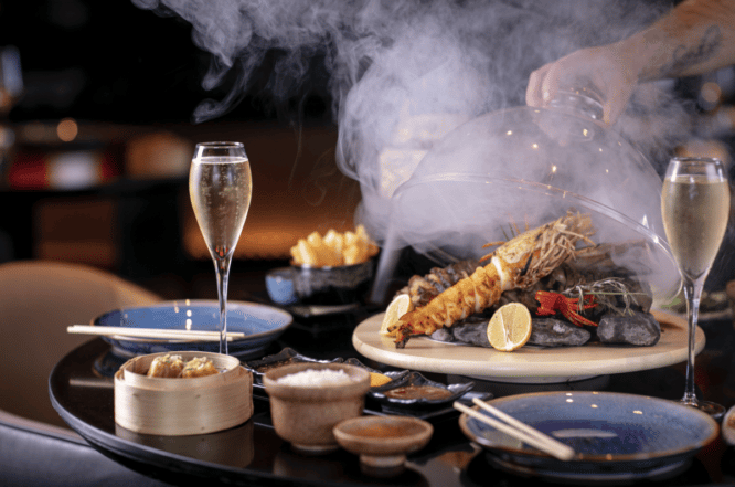 Lobster and Champagne at Chino Latino, home of one of the best New Year's Eve dinners for 2022.