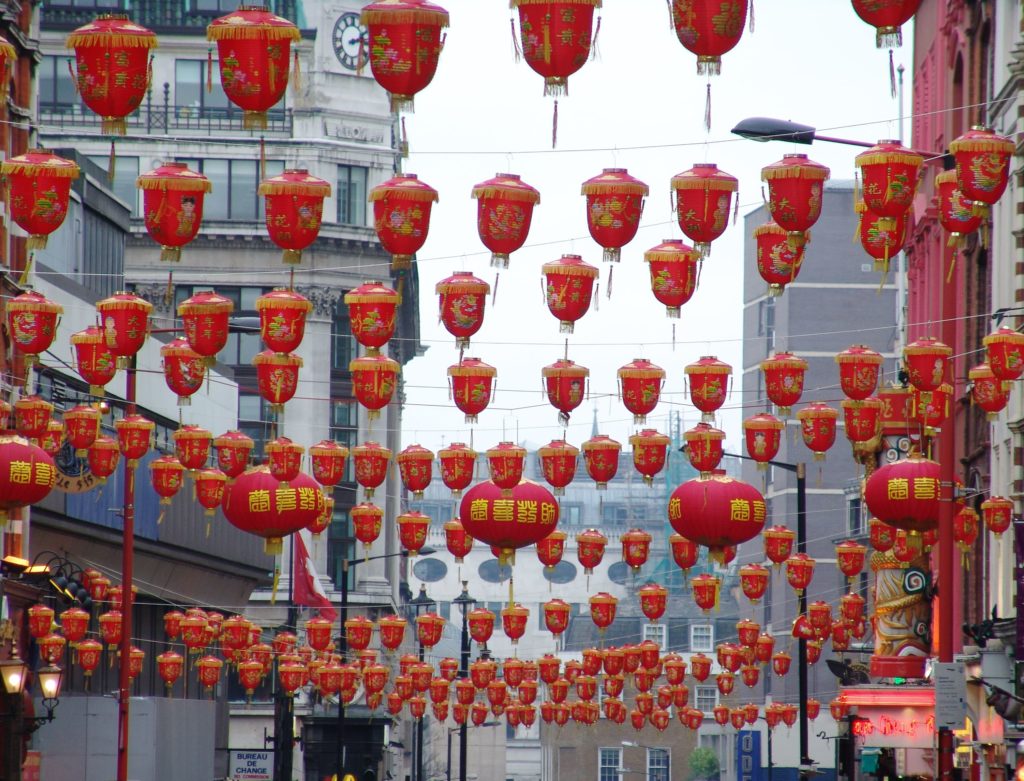 chinese lanterns criss crossing the sky