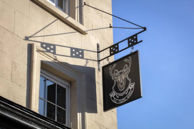 The exterior signage of the Hicce Hart pub in Islington