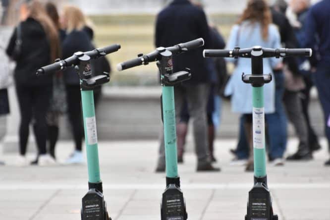 Three e-scooters in a row in London from the company Tier 