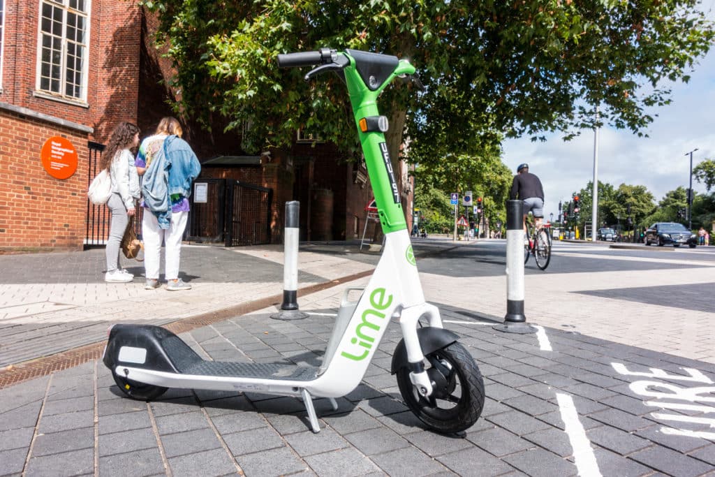 A picture of an e-scooter standing in the street from Lime, one of the best places for e-scooters in London