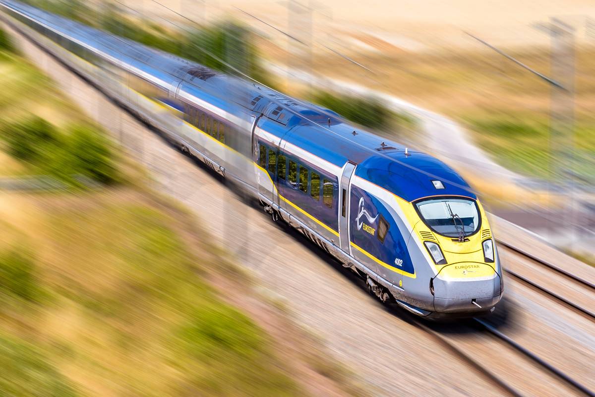 A Eurostar e320 high speed train is driving at full speed in the french countryside