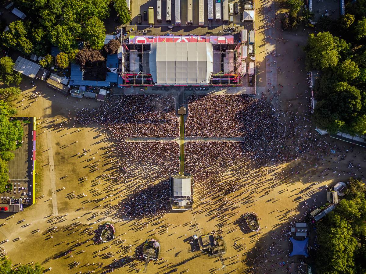 Aerial shot of crowd in front of the main music stage of Sziget Festival 2018 at sunset