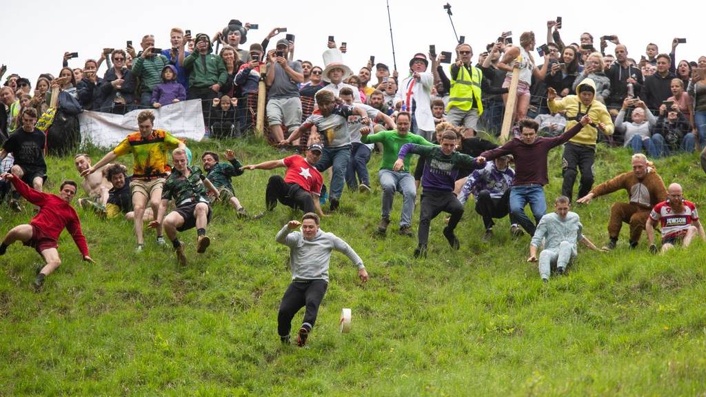 The UK’s Bone-Breaking Race Where You Chase Cheese Downhill