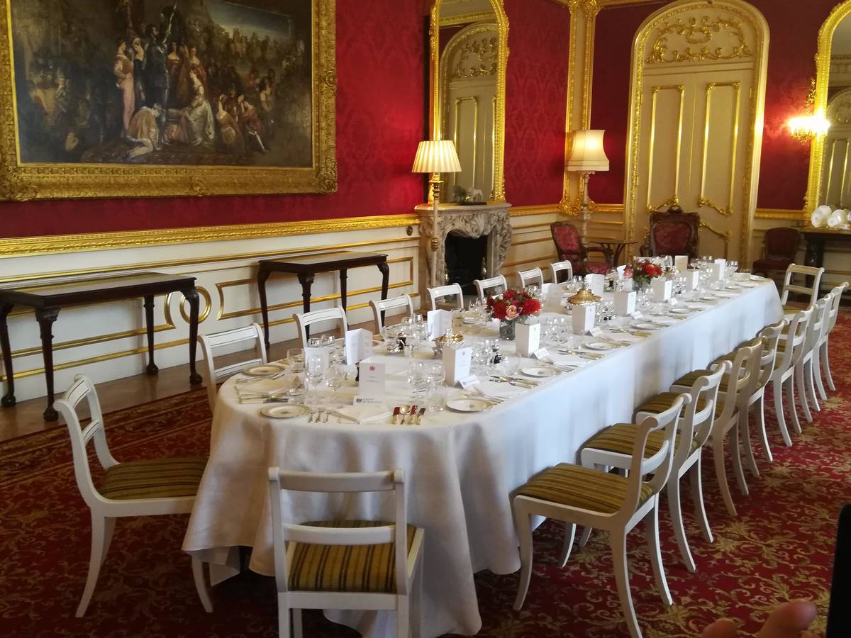 A fancy dining table set inside a room at Lancaster House