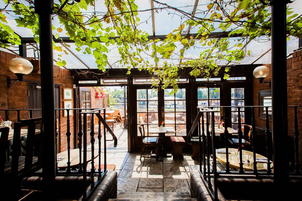 Inside the conservatory at The Dove pub in Hammersmith, London.