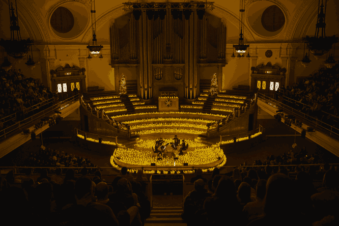 A wide shot of Central Hall Westminster during a Candlelight concert
