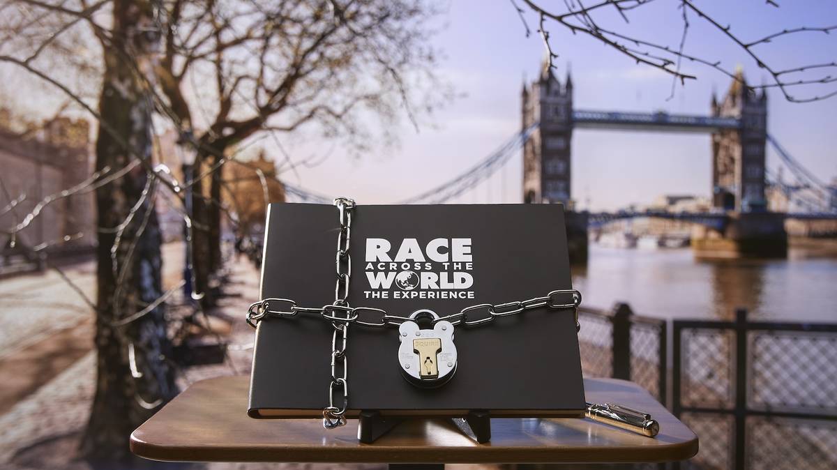 Race Across The World envelope in front of Tower Bridge in the background