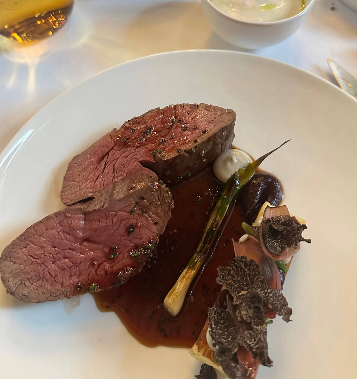 Steak dish on the table at Galvin la Chapelle restaurant in London