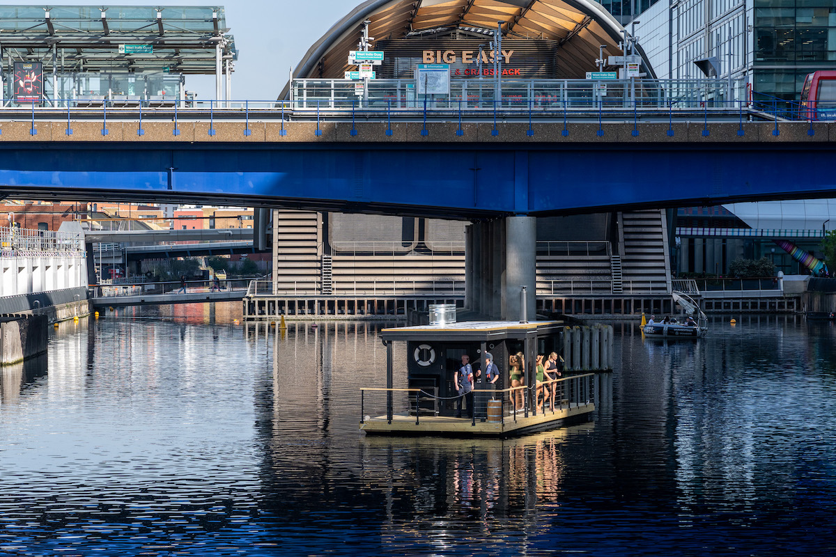 Sauna Boat saling and docking at West India Quay